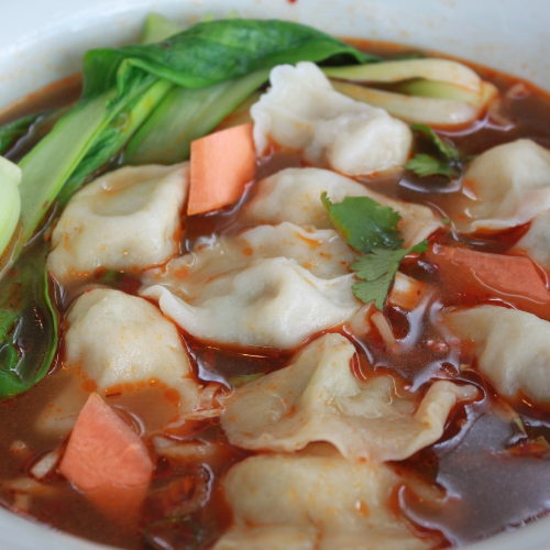 Pork &amp; Cabbage Dumplings in Hot &amp; Spicy Soup